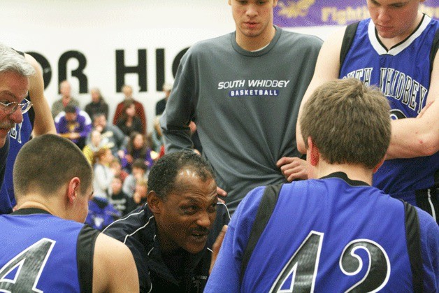 Henry Pope instructs South Whidbey during the Falcons' victory at Friday Harbor. The Falcon boys basketball team won 48-44 on Saturday.