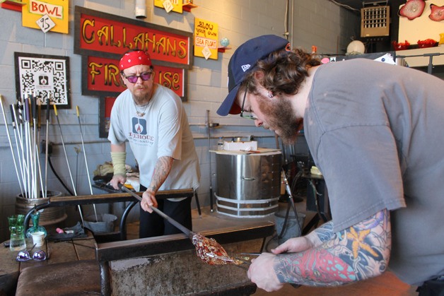 Patrick Forrestal does some detail work on a glass-blown rockfish