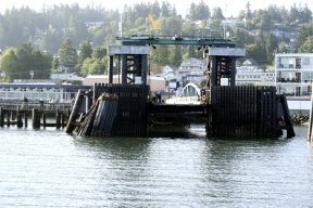 Commuters on the ferry Kitsap got a front row look at the damaged dolphin as they waited to get off the ferry on Friday. Todd Sinclair was on the first ferry to arrive at the terminal after the ferry Cathlamet crashed into the dolphin pictured on the left side of the photo above.