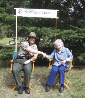 South Whidbey State Park Head Ranger Patti Anderson congratulates Maurine Ryan on the naming of the latest trail addition to the park for Ryan and her late husband Al Ryan.