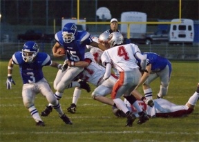 South Whidbey's leading rusher Levi Sawyers crashes through the Kings defense for the touchdown