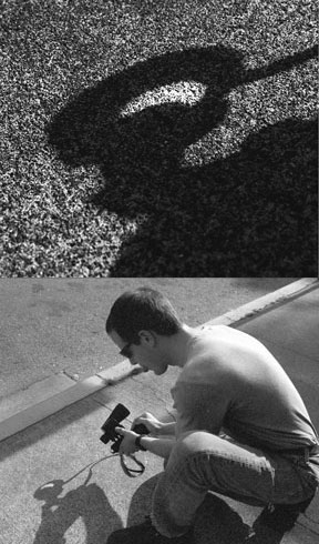 TOP: Monday's partial solar eclipse appeared to take a bite out of the sun. This image was projected onto the sidewalk using a pair of binoculars. BOTTOM: Pete Saltwick