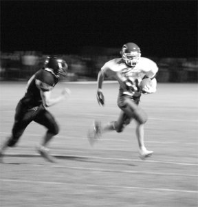 Rob Boenish powers into the end zone for his first-ever touchdown in the first quarter of Friday’s