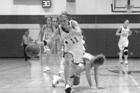 The Falcons’ Amanda LaVassar steals the ball from a Sultan opponent and head’s down court well ahead of the pack for an easy fast-break basket.