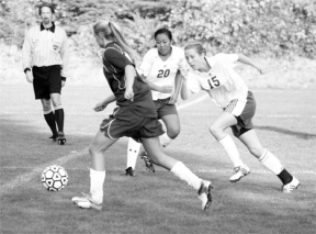 Falcons Annie Doran and Annie Schmitt chase after the ball during the Falcons 3-1 victory over Granite Falls Thursday. The team travels to Archbishop Murphy Oct. 24 for their final regular contest.