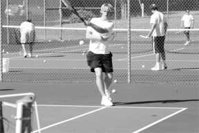 Falcon junior Sean Hough warms up for Monday’s home match against Anacortes.