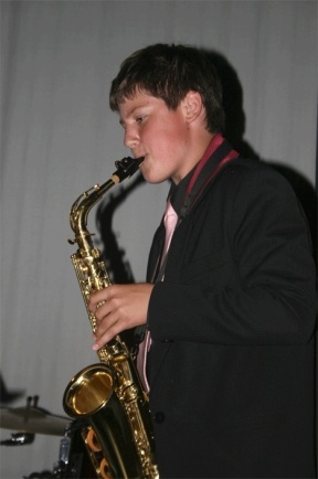 The Blue Matter Jazz Combo with sax player Landon Moore plays during the season-opener party. The band is comprised of students at South Whidbey High School and is part of the SWHS Jazz Ensemble.