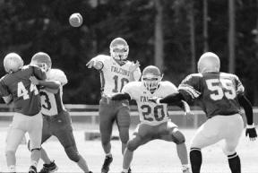 Falcon quarterback Jeremy Iverson airs out a pass during Saturday's jamboree matchup against Port Townsend. Iverson made a completion for a touchdown later in the day against Chimacum.