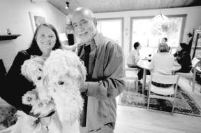 In his living room — with wife Peggy Taylor and the couple’s two dogs — Hometown Hero Rick Ingrasci seeks to make his home a comfortable place for others to meet and eat.