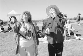 Glenda Kleppin and Jerry Graham fly a kite during last weekend's Kite Festival at Camp Casey. The joined about 4