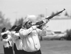 Members of the South Whidbey American Legion Post 141 honor guard fire a 21-gun salute at the Bayview Cemetery during last year's Memorial Day observance.