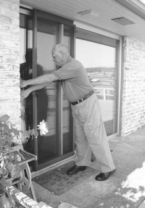 Volunteers with the Island County Sheriff's Citizen Patrol offer support services for the sheriff's department. South Precinct co-captain Walt Cartwright does a vacation check -- one of the patrol's duties -- in Langley.