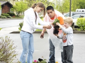 Talon Jorgenson from Langley Middle School works on a service project with other PeaceJammers during the trip to Oregon. At top