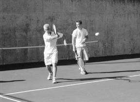 Michael Berry and Bryan Wilson warm up during pre-season practice of the South Whidbey High School tennis team. Both are seniors and returning as players on the varsity team.