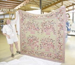 Quilt judging got underway at the Island County Fair on Monday. Here Mary Ann Pintler