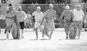 On their way to a fourth straight Maxwelton Fourth of July sack race championship