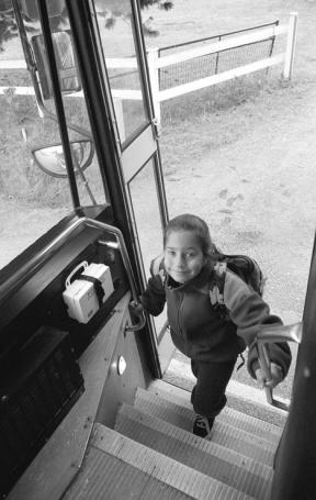 Fourth-grader Katelyn Mikolasy of Langley is a regular school bus rider. More K-5 students in the South Whidbey School District ride the bus than students in grades 6-12.