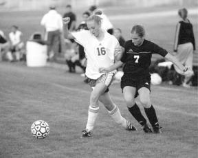 South Whidbey freshman Kaylee Baldwin gains control of the ball in the first half of Tuesday's soccer game against Mount Baker. Baldwin went on to score the first Falcon goal of the night moments later.