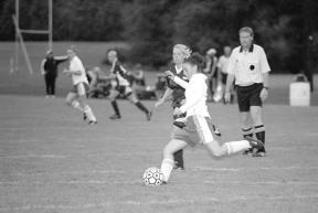 Senior defender Michelle Schorr works around the Lakewood offense Thursday to clear the ball away from the South Whidbey net.