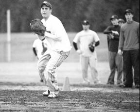 Sophomore Michael Greene lines up for a throw to first base during practice this week with the Falcon baseball team.