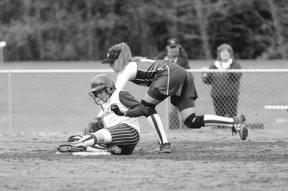 Senior Julie Robinson puts the tag on a Lakewood baserunner late in Thursday's game against Lakewood. On the flip side