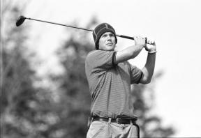 Kevin Carter watches his shot off the first tee at Useless Bay Golf and Country Club head toward marshy ground in a home meet Thursday.