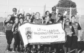 Celebrating their All-Star state championship with manager Mike Newman and coaches Lori Brown and Henry Pope July 9