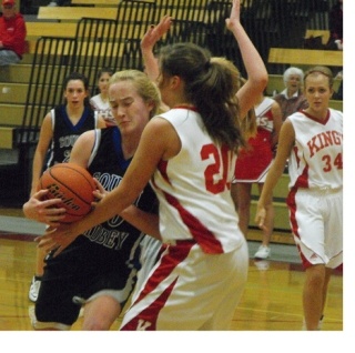 Falcon captain Lindsey Newman plays smash-and-grab basketball Friday against the King’s Knights. Newman made 36 points