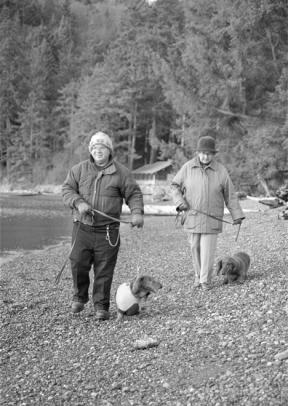 Kurt and Margaret Priebe enjoy a walk on the beach of Bowman Bay in Deception Pass State Park last week with their dogs