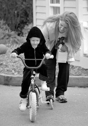 Kaitie loves riding so much that her parents bought her a two-wheeler to ride in the halls of Children’s Hospital