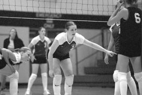 Junior setter Brianna Hussey directs her teammates