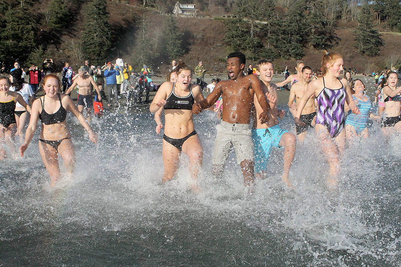 Polar bears dip into new year at Double Bluff Beach Park