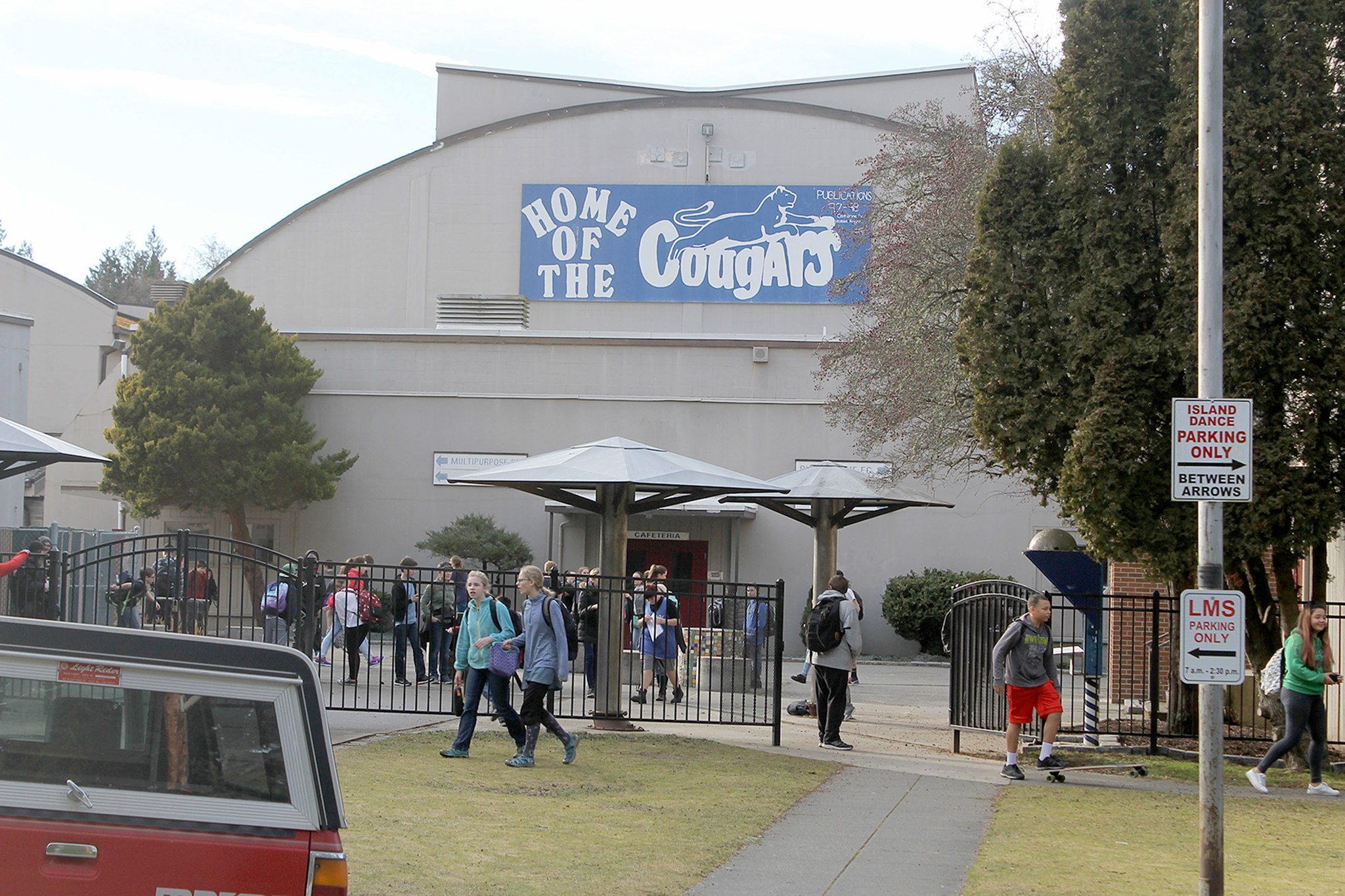 Evan Thompson / The Record — Langley Middle School students pour out of school for the day on Friday afternoon. The South Whidbey School Board voted 4-1 to close the school on Wednesday night.