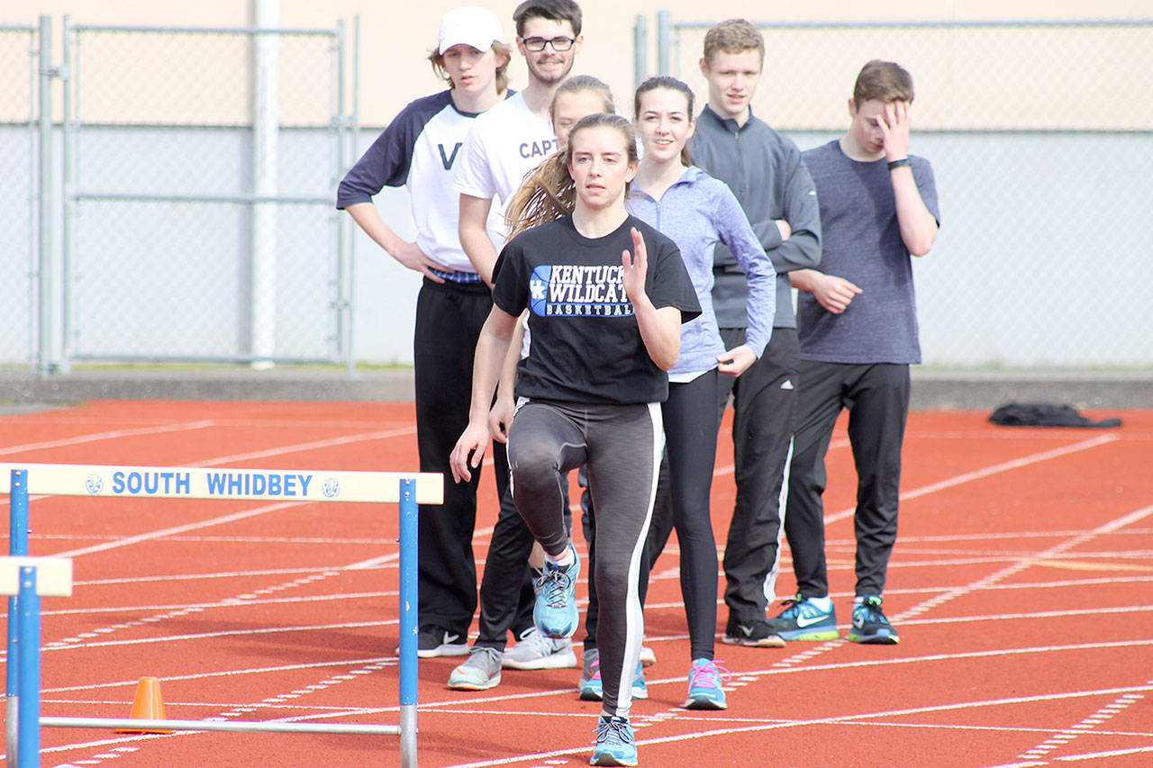 Evan Thompson / The Record — South Whidbey junior Sophia Nielsen practices her hurdling form at a recent track and field practice.