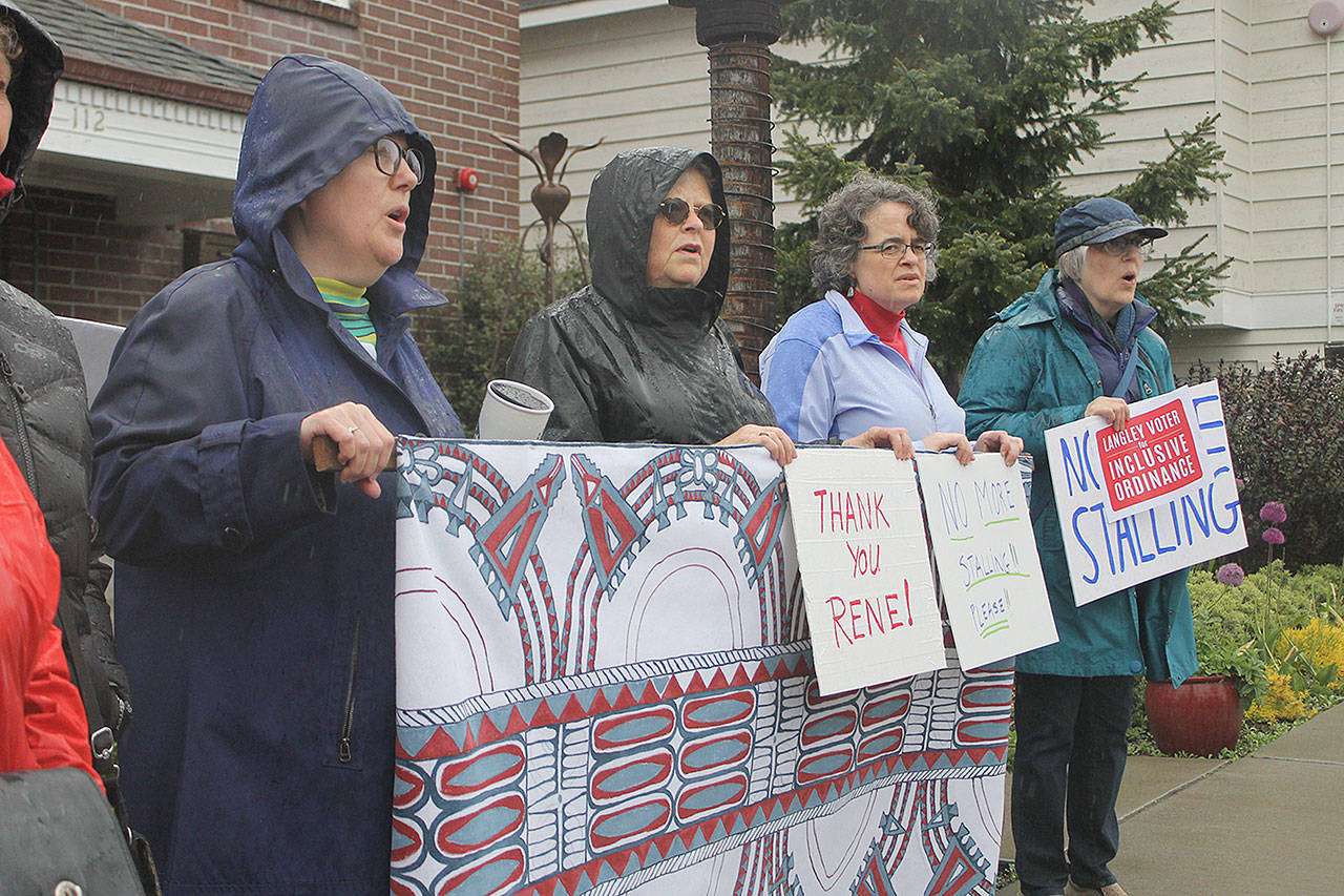 Evan Thompson / The Record — Advocates of the draft inclusive city ordinance marched up Second Street to city hall before Monday night’s Langley City Council meeting.