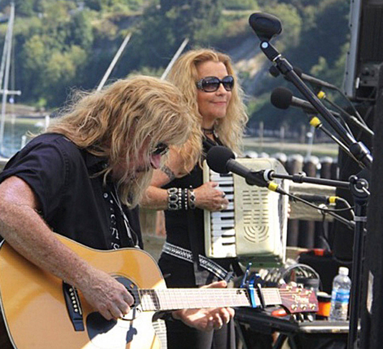 Sharon Lundahl photo — Joe Reggiatore and Janie Cribbs, from Janie Cribbs and the T. Rust Band, perform as a duo at a previous Dock Stock.