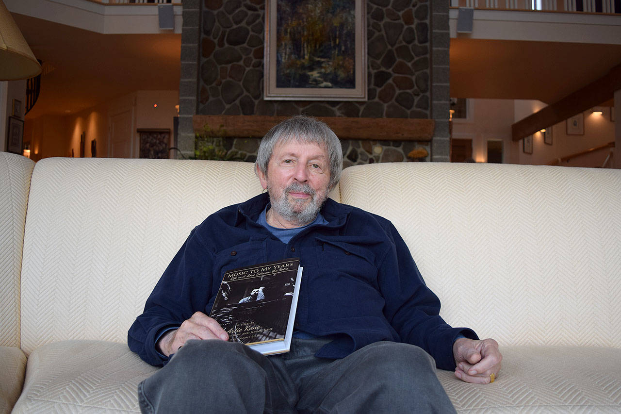 Kyle Jensen / The Record — Artie Kane, Clinton resident, holds his biography slated for release next week. Kane worked as Hollywood’s go-to studio pianist for decades.