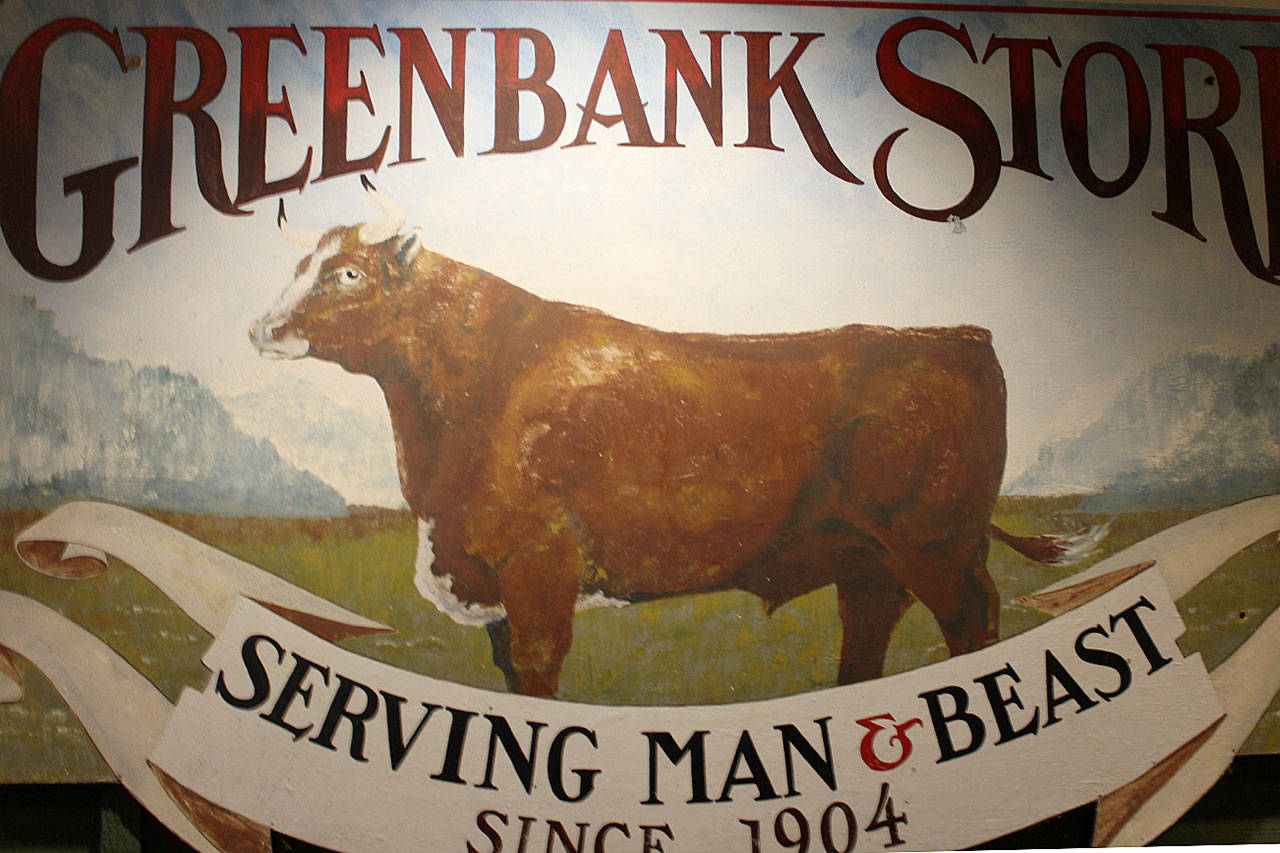 The iconic logo on the side of Greenbank Store.