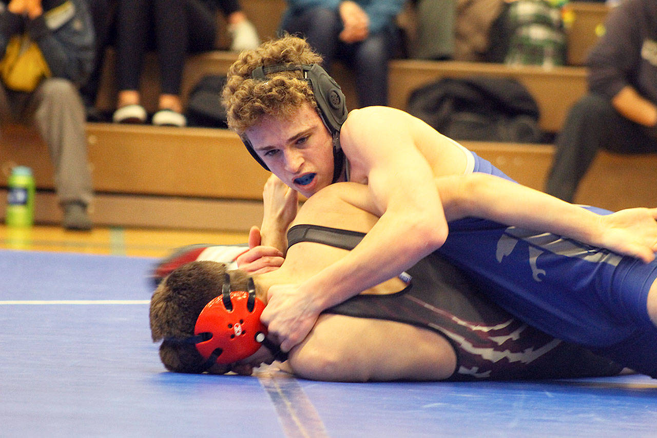 South Whidbey senior — Micah Tarantino attempts to pin Cedarcrest’s Curtis Nelson at the Falcons’ senior night match on Jan. 25 at Erickson Gymnasium.