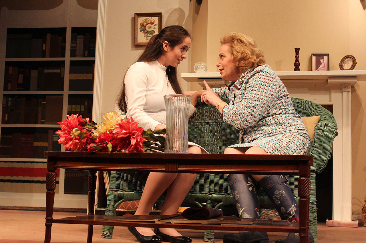 High school student Trinity Slowik, playing the character Midge Harvey, held her own in scenes with long-time actress Ingrid Schwalbe, playing the formidable Miss Lucy Angkatell in “The Hollow,” at Whidbey Playhouse until April 29. Photo by Patricia Guthrie/Whidbey News Group