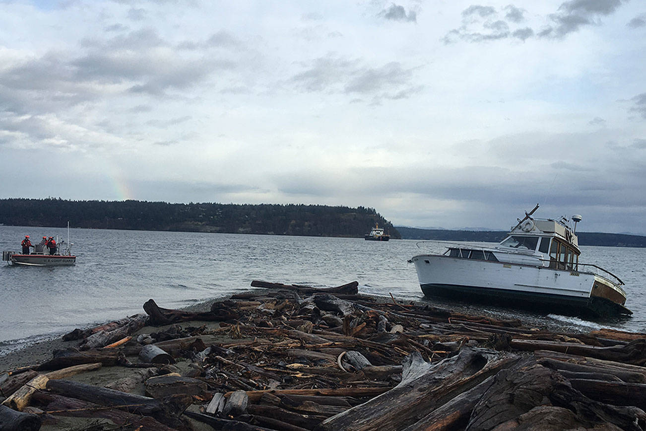 Mystery boat washes ashore on Sandy Point beach