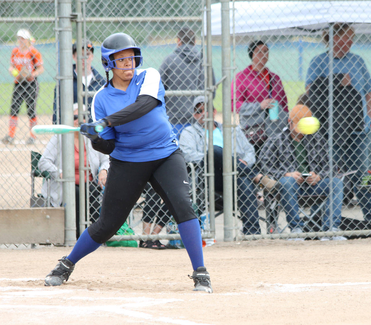 Arianna Briggs attacks a pitch in South Whidbey’s district softball game with Mount Baker Thursday. (Photo by Jim Waller/South Whidbey Record)