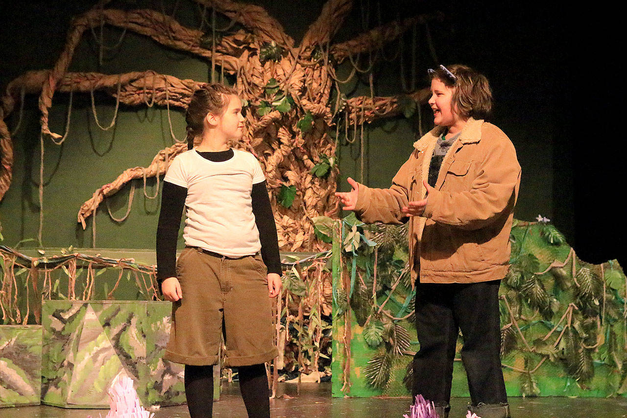 Mowgli (played by June Murray) and Baloo (Corin Boyd) begin their song, “The Bear Necessities.”