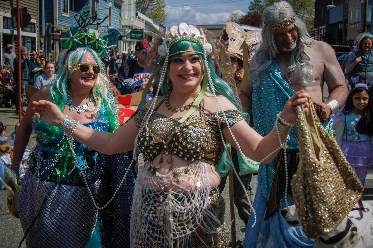 Photo by David Welton
Mermaids Shelley Sue Olson, left, and Tessa Karno made a splash at Saturday’s Welcome the Whales parade in Langley in some of the most eye-catching costumes present. Karno’s husband, Richard, dressed as Poseidon to accompany the group of mermaids, who are belly dancers known for an annual flash mob event called the Shimmy Mob.