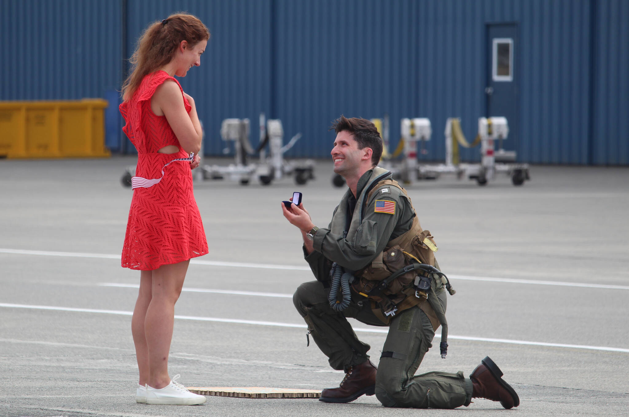 Lt. Colby Diamond proposes to his girlfriend, Deirdre Tomlinson shortly after returning home from deployment. (Photo by Karina Andrew/Whidbey News-Times)