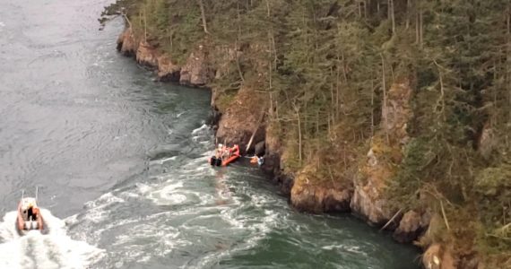 Image provided
A screenshot from a North Whidbey Fire and Rescue video shows Marine Search and Rescue vessels assisting two kayakers who were swept out of Cornet Bay by the strong currents under Deception Pass bridge Sept. 11.