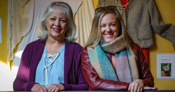 Photos by David Welton
Costume designer Valerie Johnson, left, and Island Shakespeare Festival Artistic Director Olena Hodges stand before a display of costumes worn in the theater company’s productions.