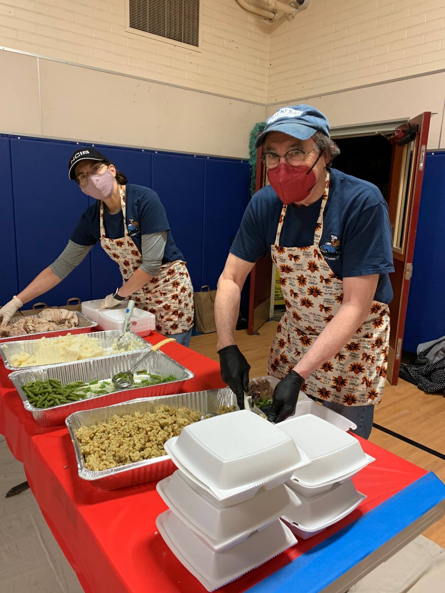 Photo provided
Jennifer and Paul Morris assemble meals for Mobile Turkey Unit last year.