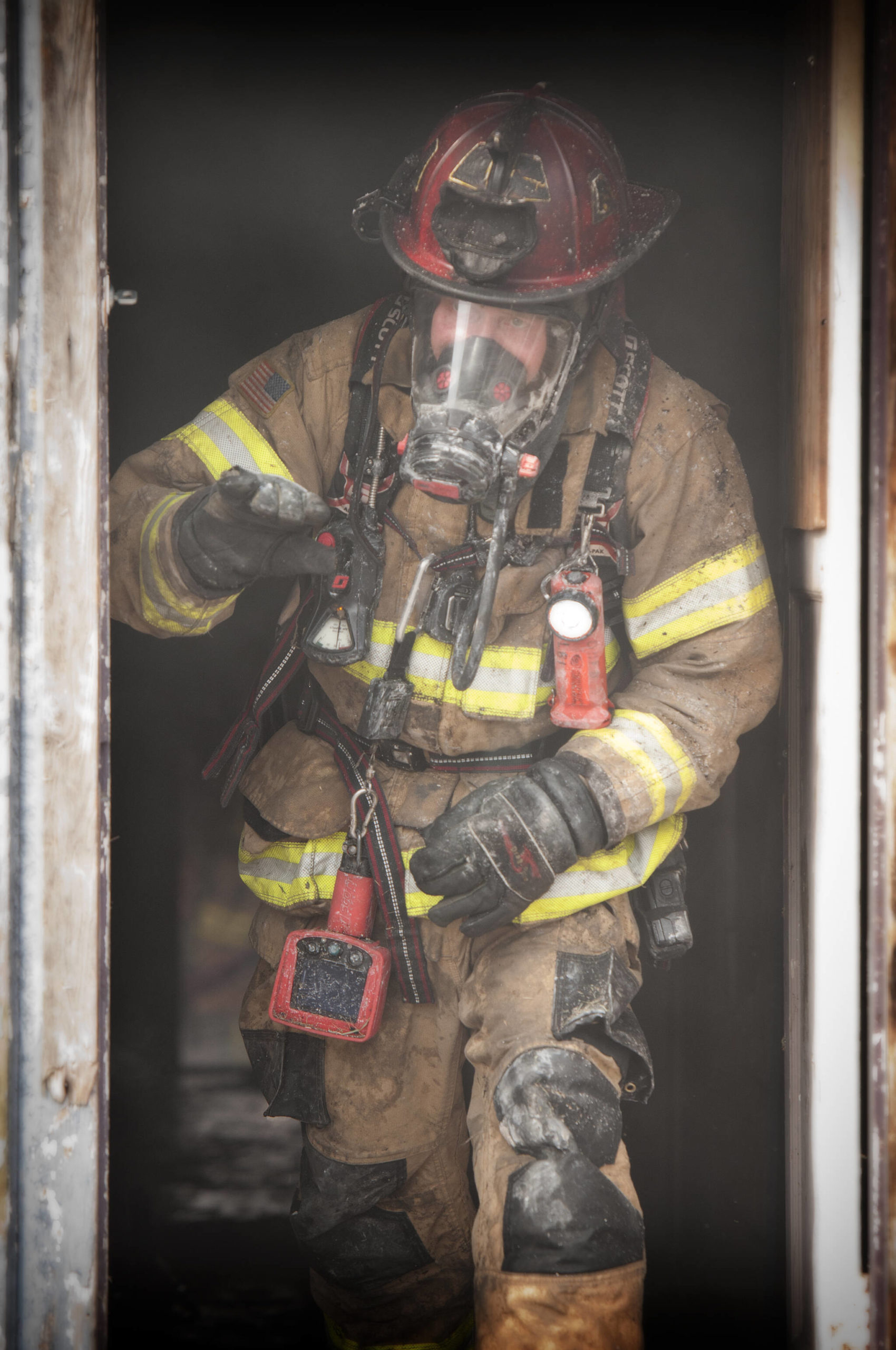 Photo by Cheryl Andersson 
Oak Harbor firefighters at a training burn in April of this year.