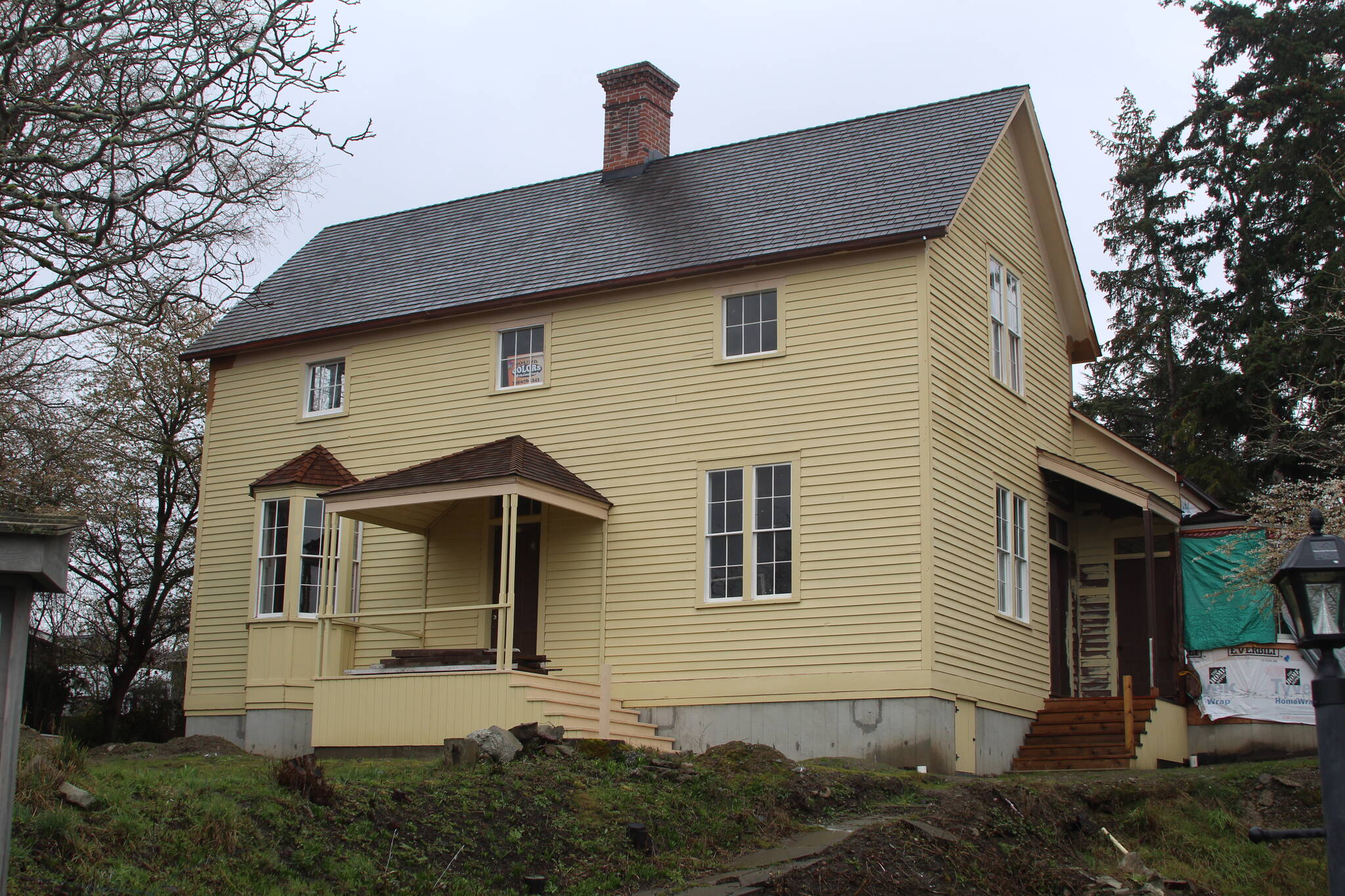 The Haller House is primed for its final paint job, which will be brown and tan. (Photo by Karina Andrew/Whidbey News-Times)